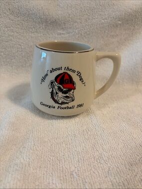 Georgia Football 1981 Cream Mug with Red & Black Bulldog Graphic.